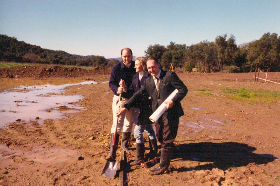 Chappellet three people with a shovel and roll of paper