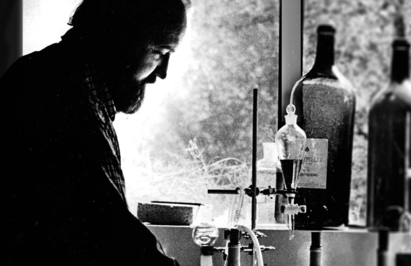 Donn Chappellet sitting in front of chemical instruments