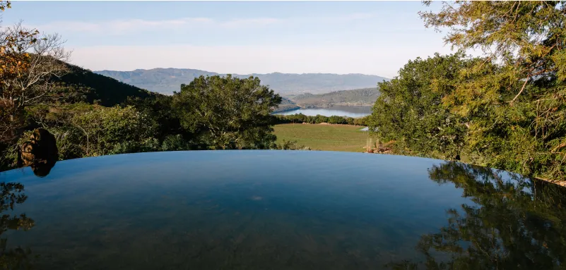 scenic view of mountains and lake