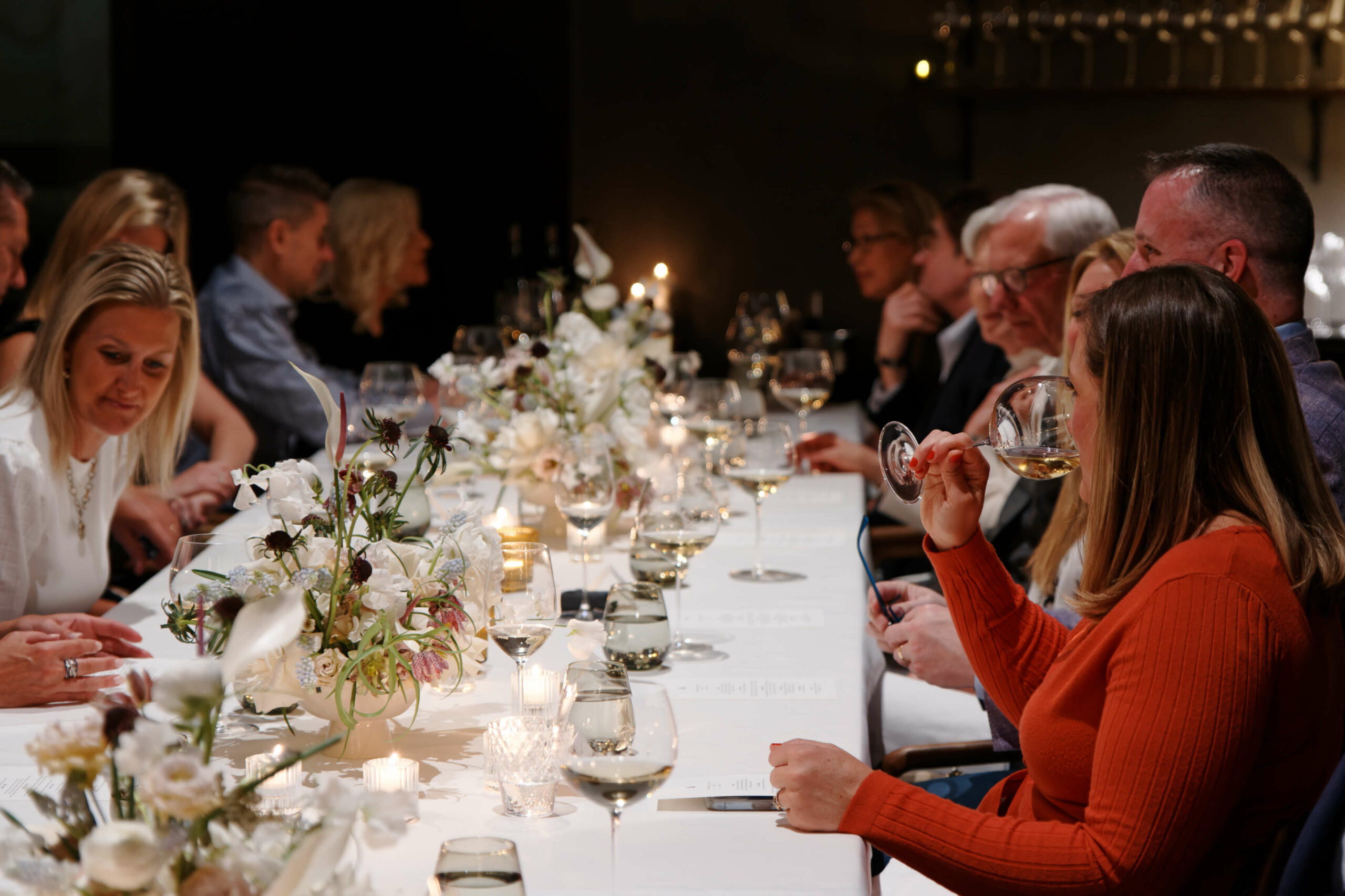 People sitting drinking wine