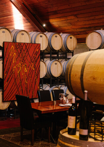 Tasting room with stacked barrels